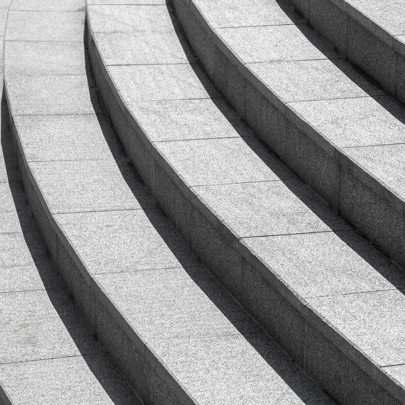 Abstract architecture background, dark gray round stairs